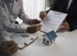 Borrower signing paperwork for non-QM loans in Florida